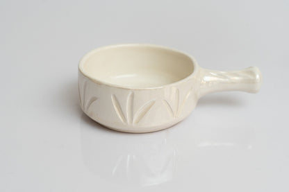 Bowl with hand
