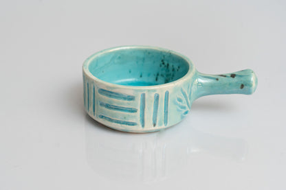 Bowl with hand